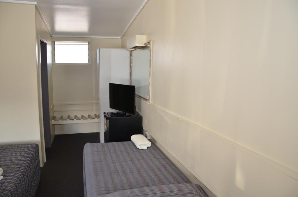 Warwick Motor Inn Værelse billede